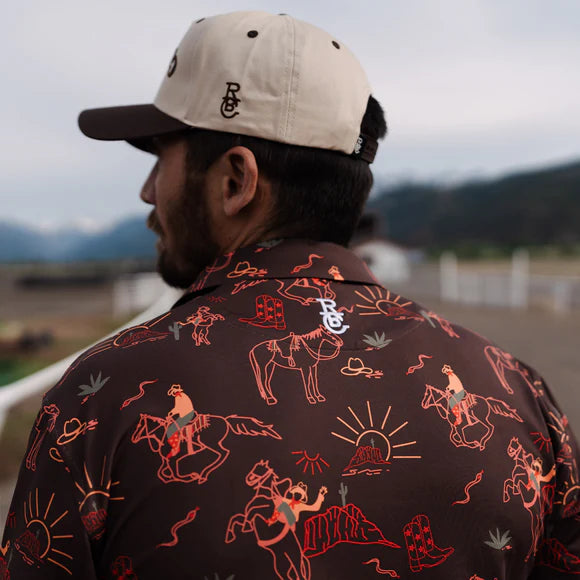 Raised By Coyotes- Red Rock Rider Golf Polo
